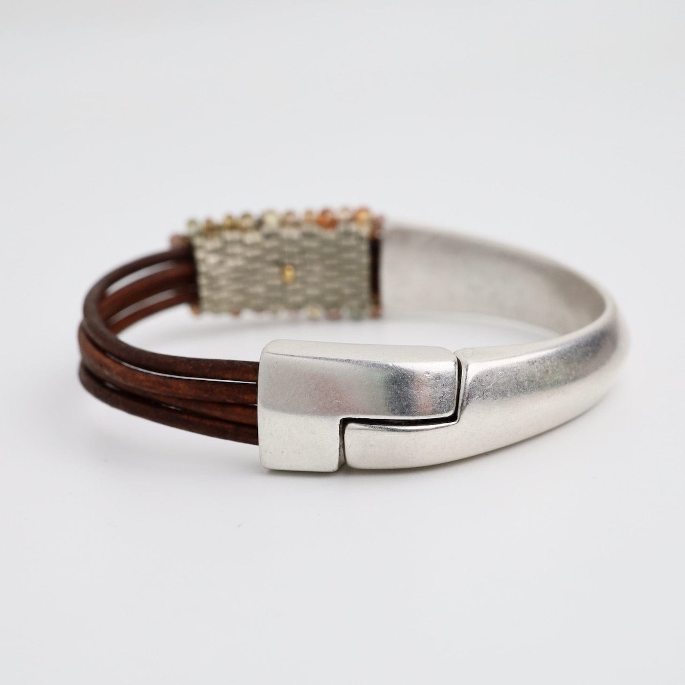 Load image into Gallery viewer, BRC-JM Hand Stitched Multi-Faceted Earth Tone Zircon Half Cuff Bracelet
