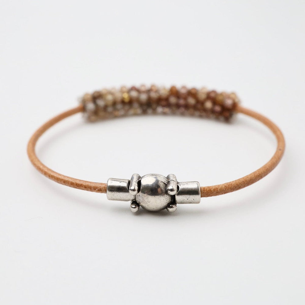 
                  
                    BRC-JM Hand Stitched Multi-Faceted Natural Zircon on Natural Leather Bracelet
                  
                