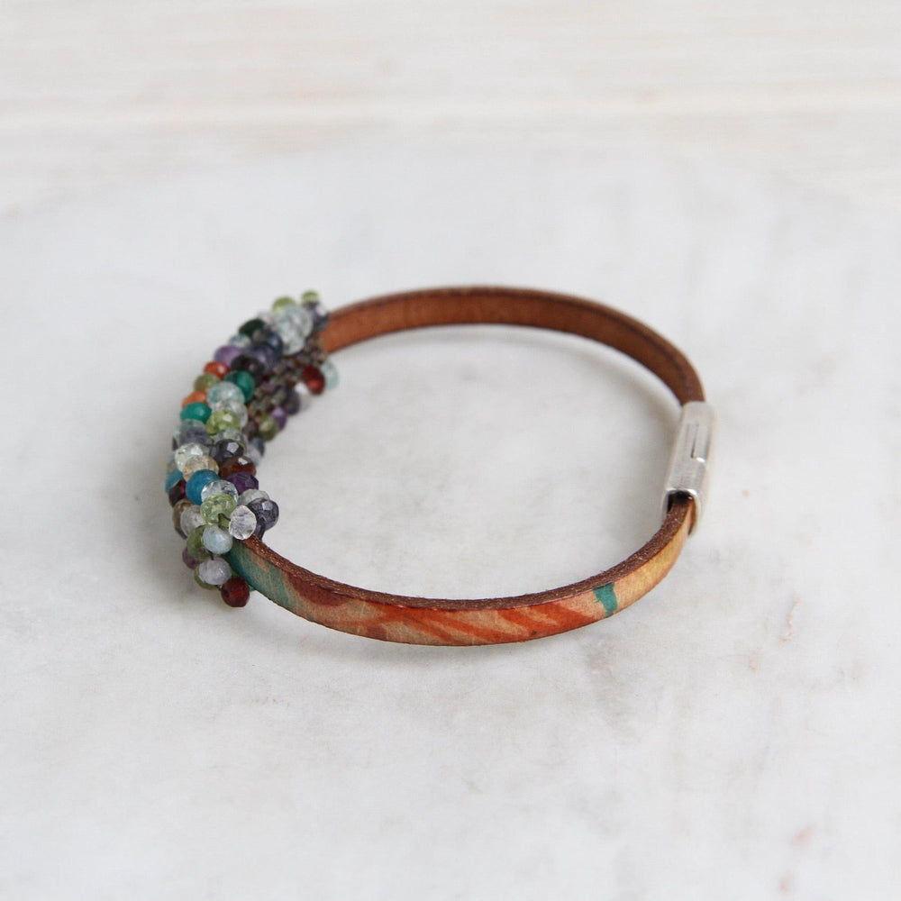 
                  
                    BRC-JM Hand Stitched Multi Gem Stones on Printed Leather Bracelet
                  
                