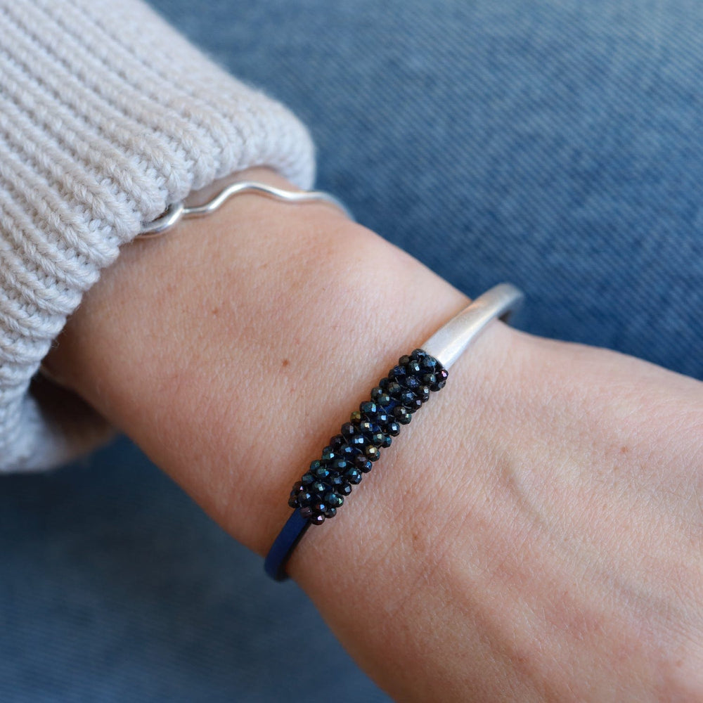 
                  
                    BRC-JM Hand Stitched Mystic Blue Spinel Bracelet
                  
                