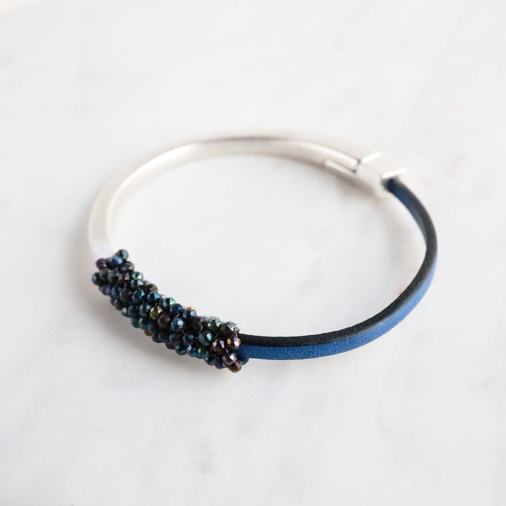 
                  
                    BRC-JM Hand Stitched Mystic Blue Spinel Bracelet
                  
                