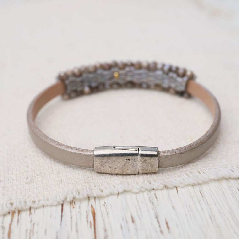 
                  
                    BRC-JM Hand Stitched Mystic Brown Labradorite & Champagne Leather Bracelet
                  
                