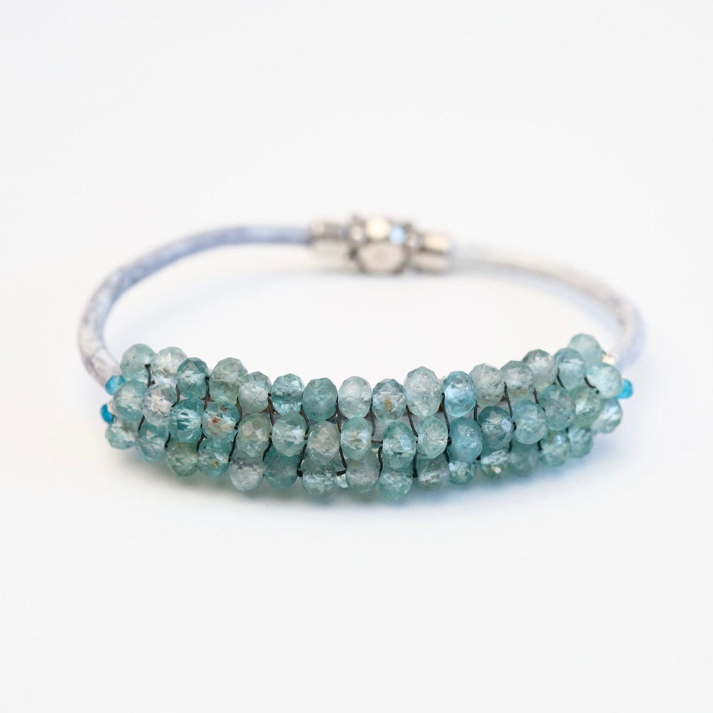 
                  
                    BRC-JM Hand Stitched Neon Apatite with Silver Trim Bracelet
                  
                