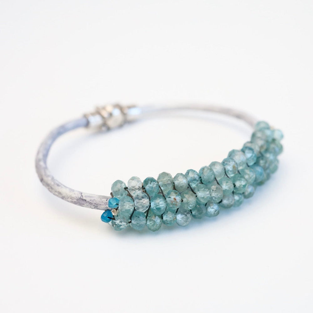 
                  
                    BRC-JM Hand Stitched Neon Apatite with Silver Trim Bracelet
                  
                