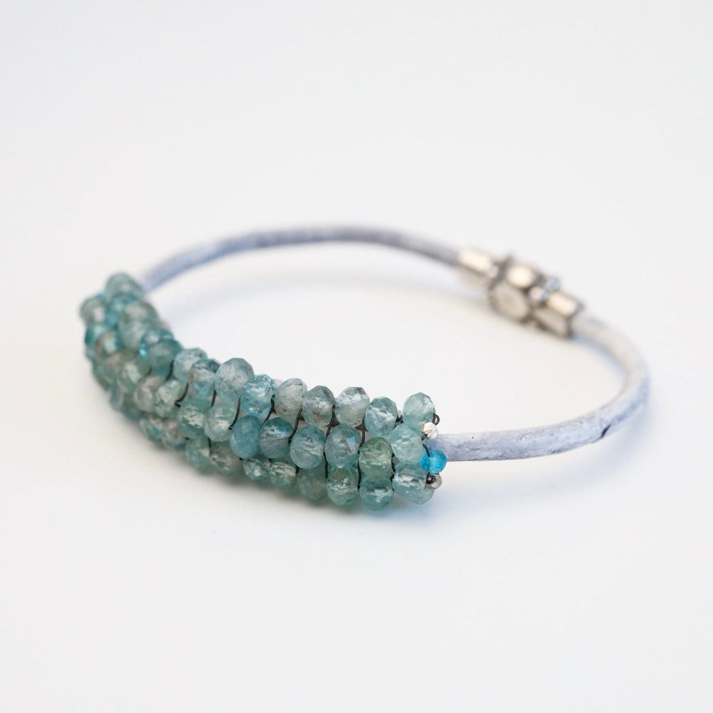 
                  
                    BRC-JM Hand Stitched Neon Apatite with Silver Trim Bracelet
                  
                