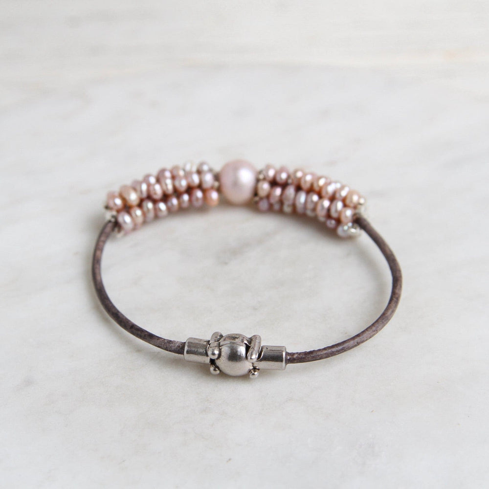 
                  
                    BRC-JM Hand Stitched Pale Pink Pearl Bracelet
                  
                