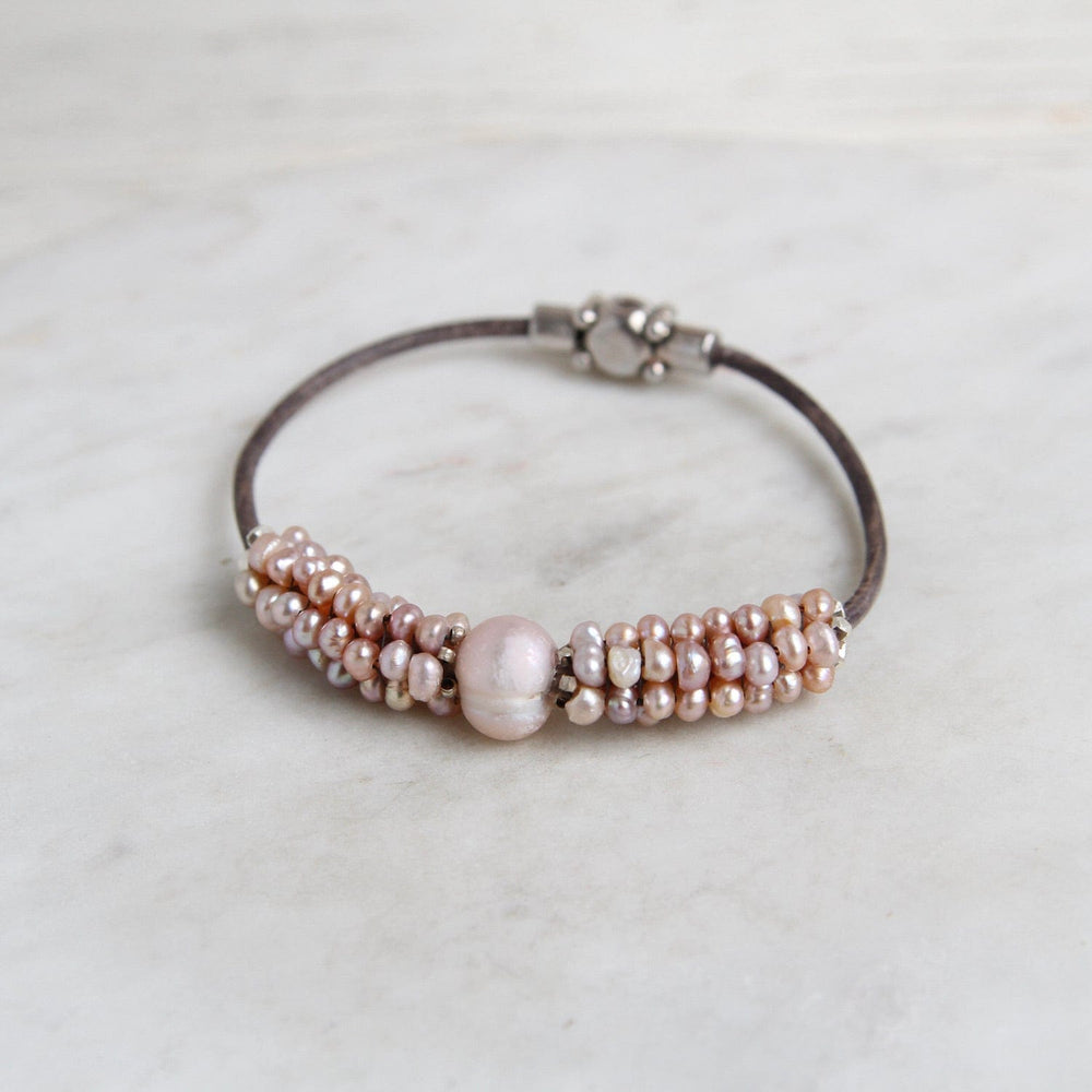 
                  
                    BRC-JM Hand Stitched Pale Pink Pearl Bracelet
                  
                