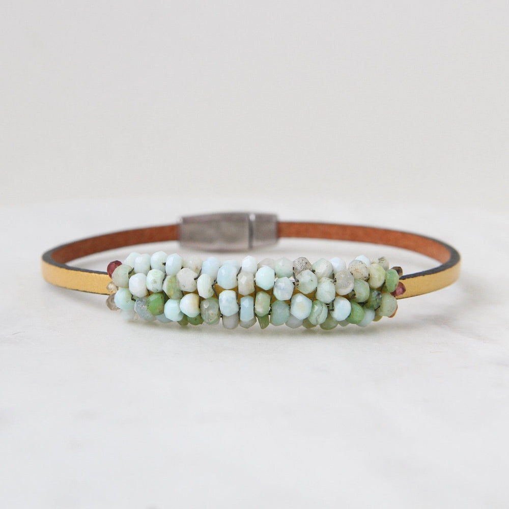 
                  
                    BRC-JM Hand Stitched Peruvian Opal & Hessonite Garnet Bracelet
                  
                