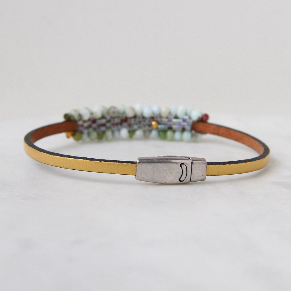 
                  
                    BRC-JM Hand Stitched Peruvian Opal & Hessonite Garnet Bracelet
                  
                