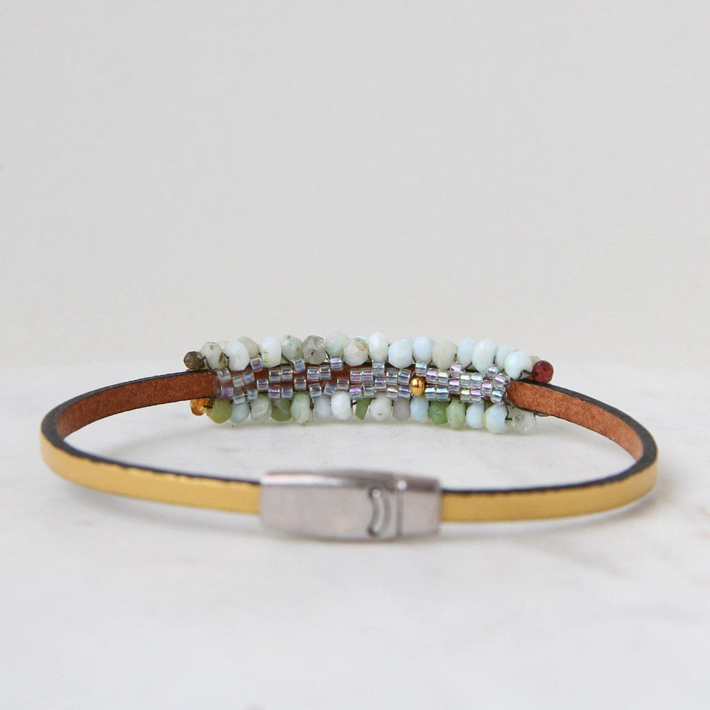 
                  
                    BRC-JM Hand Stitched Peruvian Opal & Hessonite Garnet Bracelet
                  
                