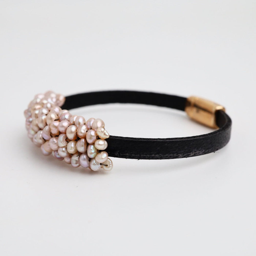 
                  
                    BRC-JM Hand Stitched Pink Pearls on 5mm Vintage Black Leather Bracelet
                  
                