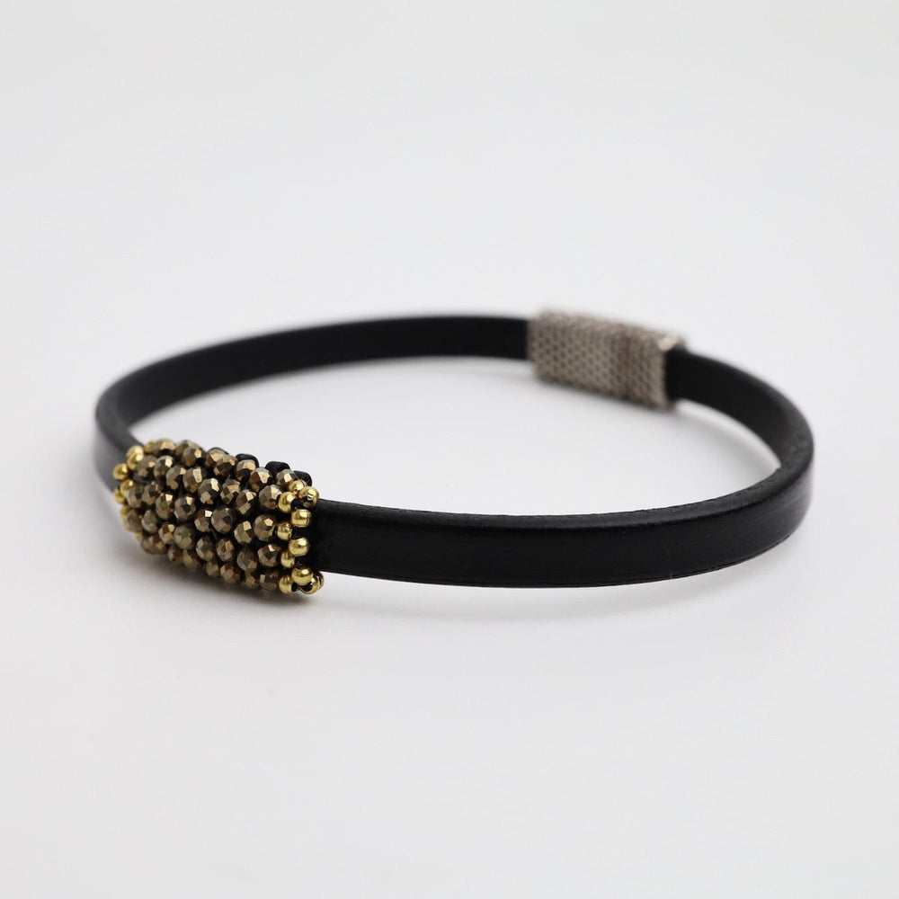 
                  
                    BRC-JM Hand Stitched Pyrite Leather Bracelet
                  
                