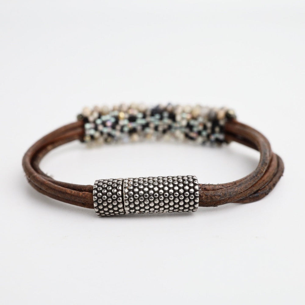 
                  
                    BRC-JM Hand Stitched Russian Opal & Pyrite and Multi Strand Grey Leather Bracelet
                  
                