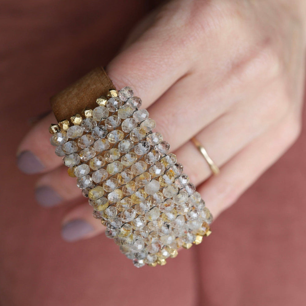 
                  
                    BRC-JM Hand Stitched Rutilated Quartz with Large Vermeil Trim on Mocha Leather Bracelet
                  
                