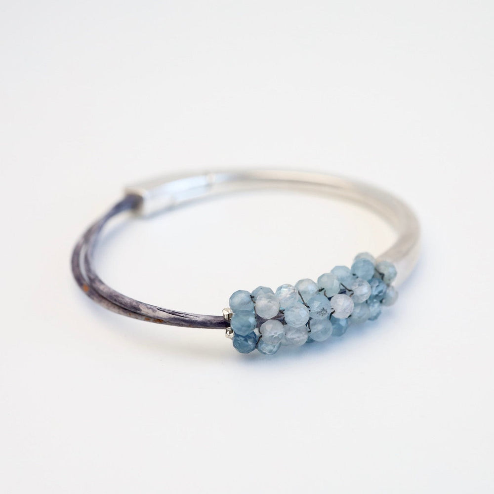 
                  
                    BRC-JM Hand Stitched Shaded Aquamarine 1.2 Cuff Bracelet
                  
                