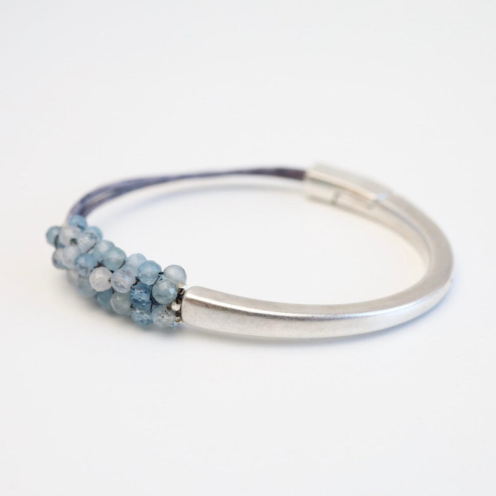 
                  
                    BRC-JM Hand Stitched Shaded Aquamarine 1.2 Cuff Bracelet
                  
                