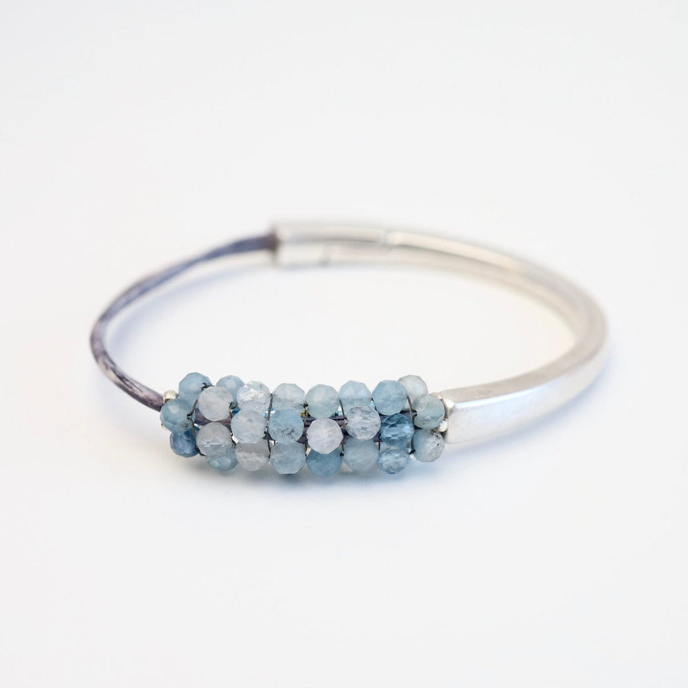 
                  
                    BRC-JM Hand Stitched Shaded Aquamarine 1.2 Cuff Bracelet
                  
                