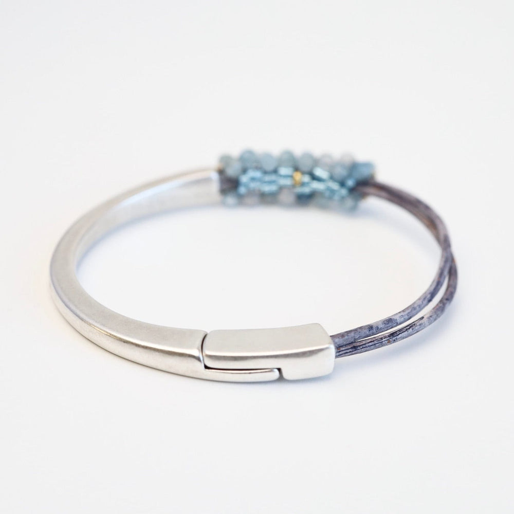 
                  
                    BRC-JM Hand Stitched Shaded Aquamarine 1.2 Cuff Bracelet
                  
                