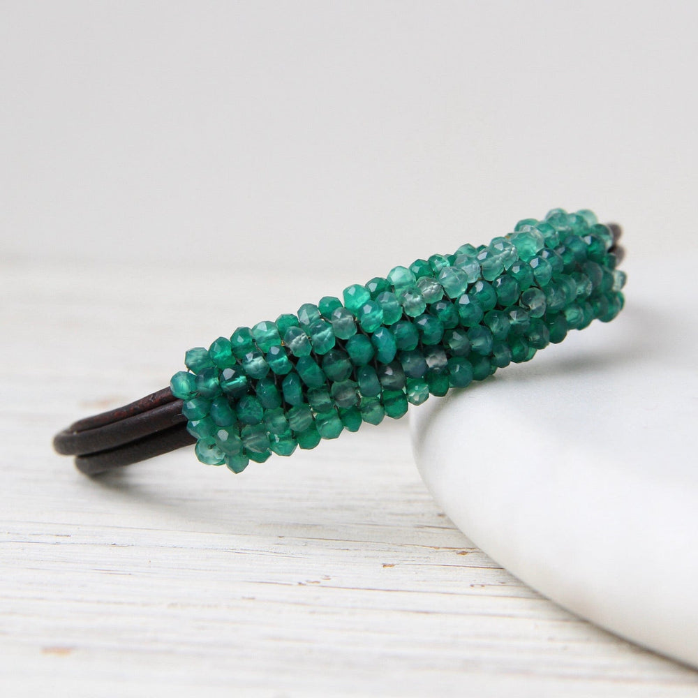 
                  
                    BRC-JM Hand Stitched Shaded Green Quartz Bracelet
                  
                