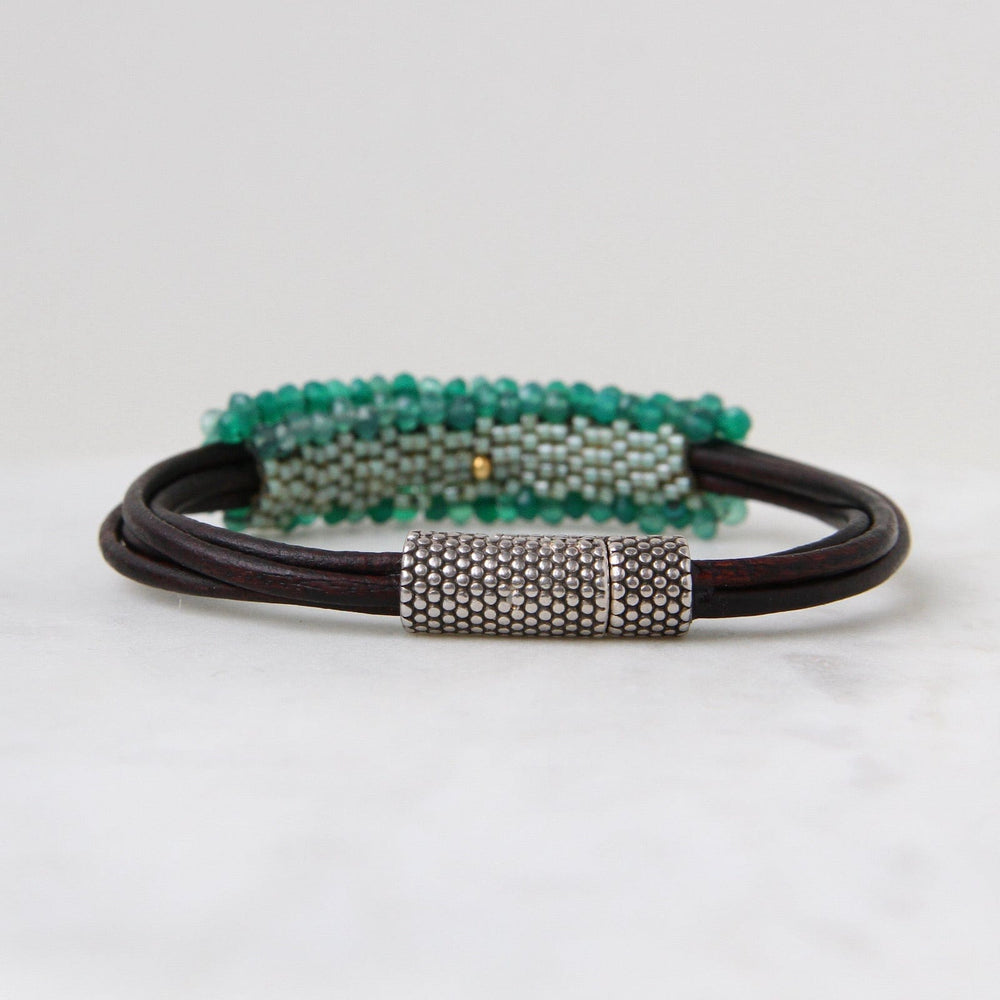 
                  
                    BRC-JM Hand Stitched Shaded Green Quartz Bracelet
                  
                