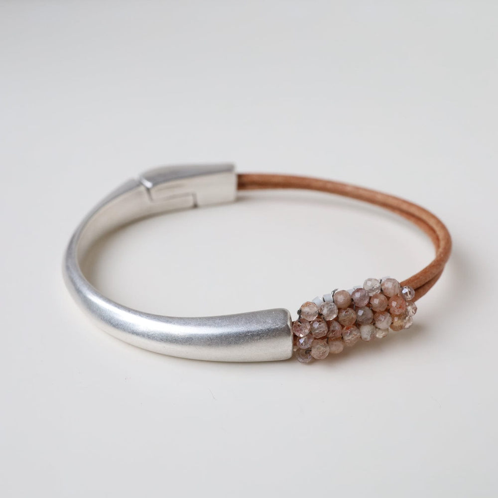 
                  
                    BRC-JM Hand Stitched Shaded Peach Moonstone Bracelet
                  
                