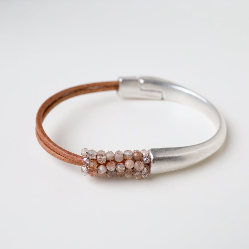 
                  
                    BRC-JM Hand Stitched Shaded Peach Moonstone Bracelet
                  
                