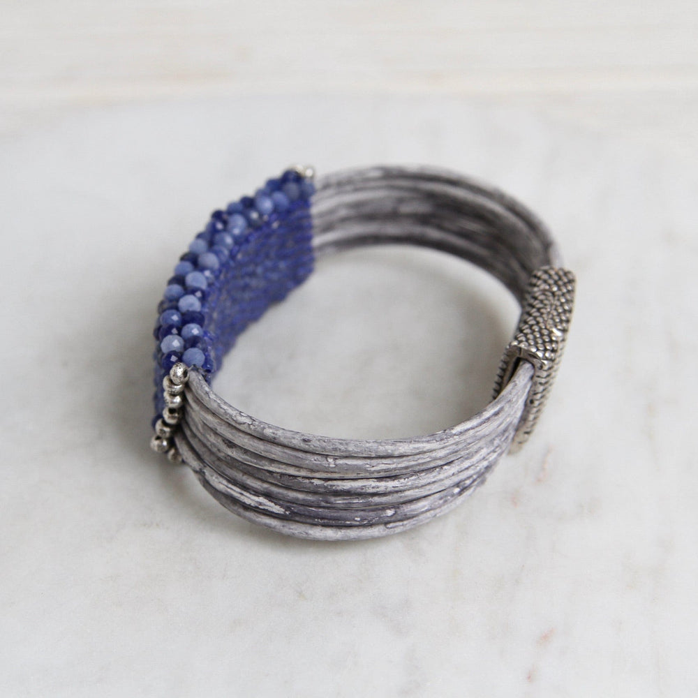 
                  
                    BRC-JM Hand Stitched Shaded Sodalite with Hill Tribe Stamped Fine Silver Bead Trim Bracelet
                  
                