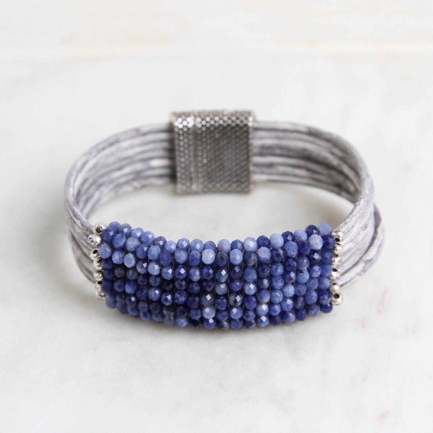 BRC-JM Hand Stitched Shaded Sodalite with Hill Tribe Stamped Fine Silver Bead Trim Bracelet