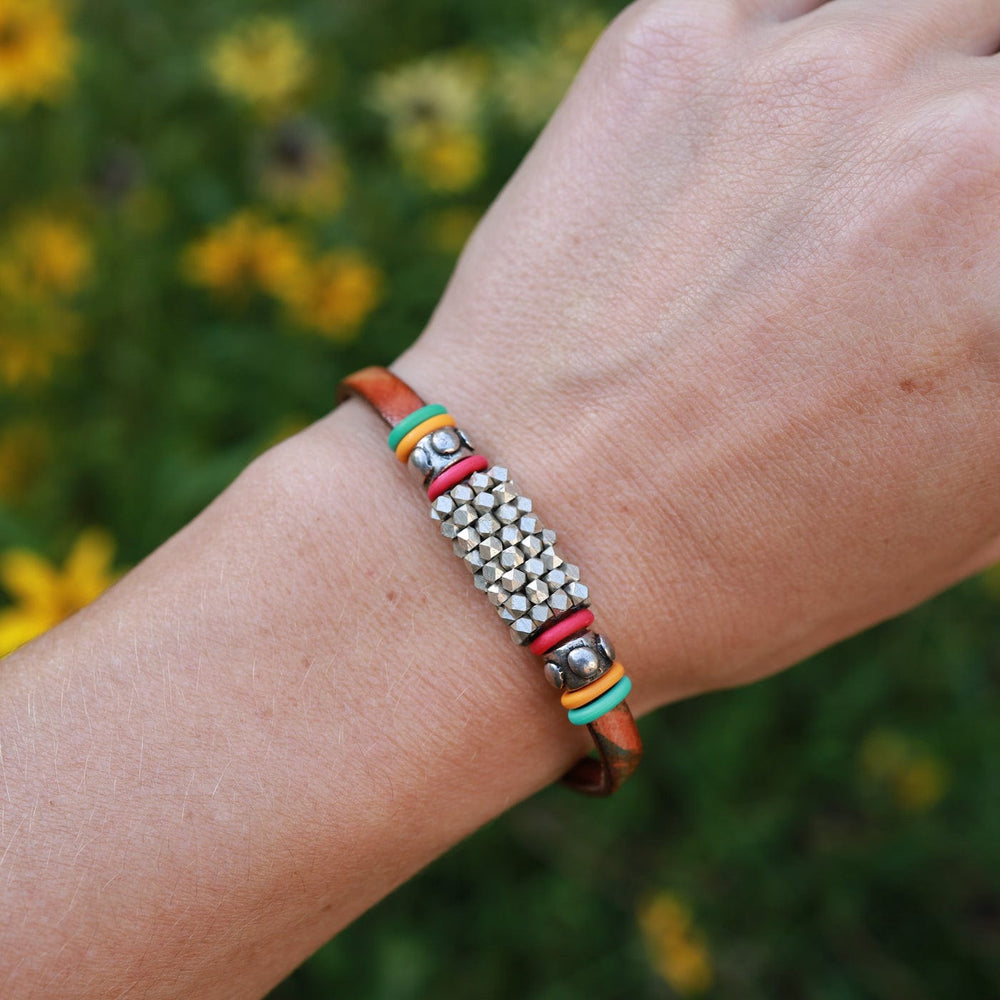 
                  
                    BRC-JM Hand Stitched Silver Cube Beads with Colored "O" Ring Bracelet
                  
                