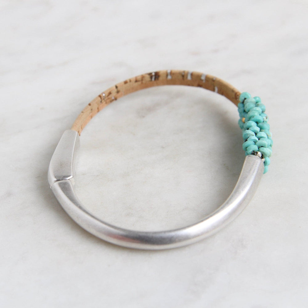 
                  
                    BRC-JM Hand Stitched Sleeping Beauty Turquoise & Cork 1/2 Cuff Bracelet
                  
                