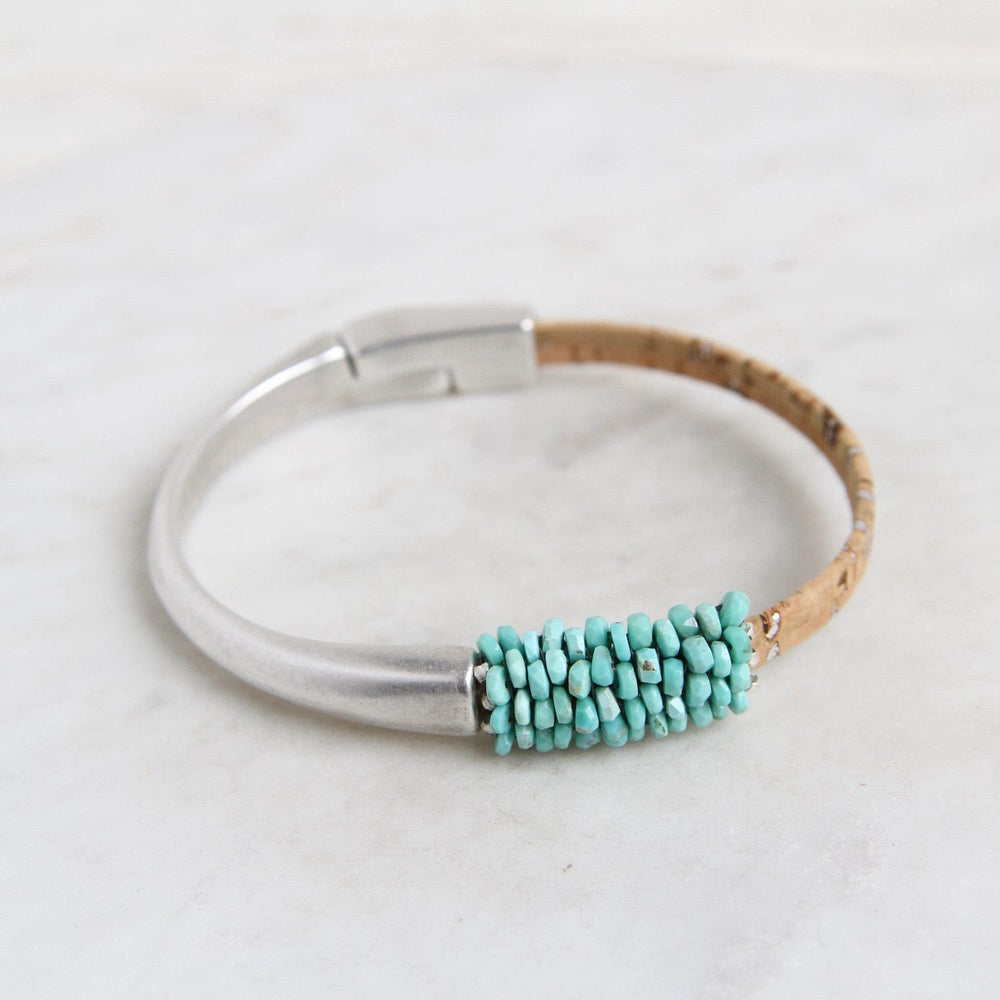 
                  
                    BRC-JM Hand Stitched Sleeping Beauty Turquoise & Cork 1/2 Cuff Bracelet
                  
                