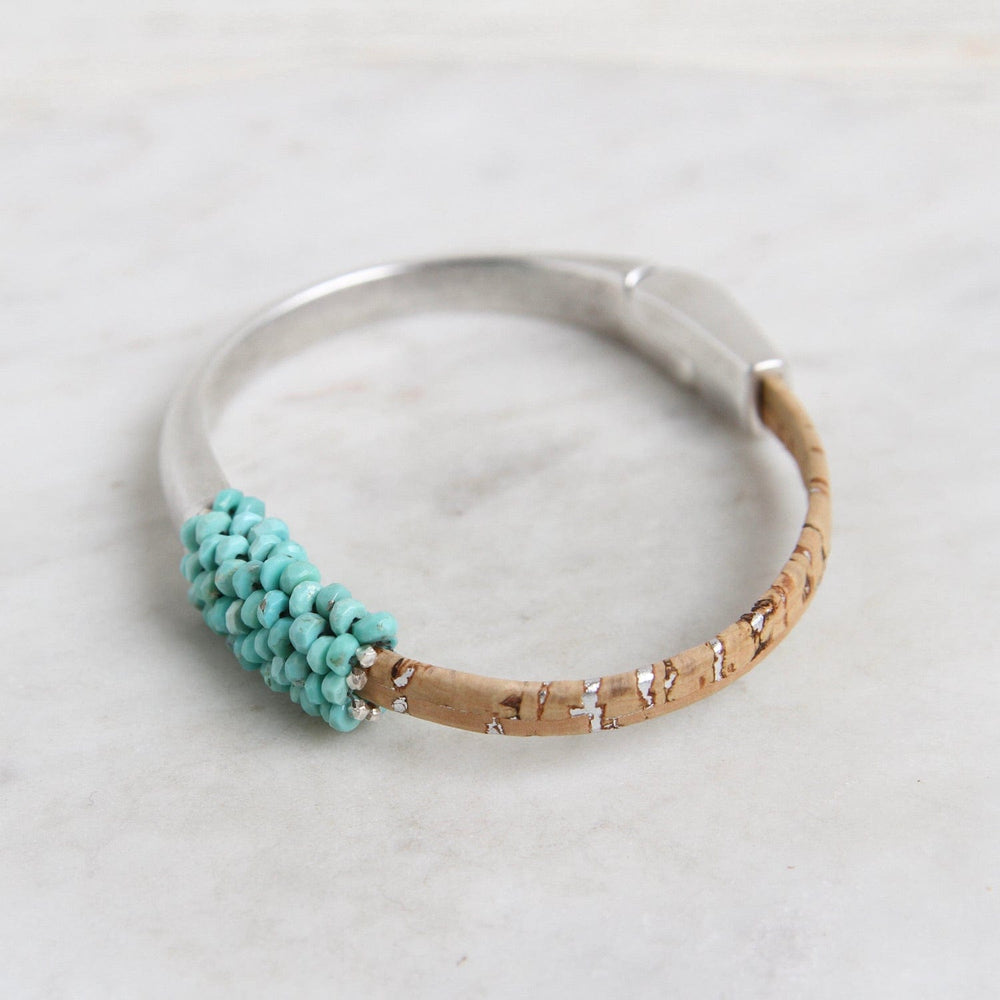 
                  
                    BRC-JM Hand Stitched Sleeping Beauty Turquoise & Cork 1/2 Cuff Bracelet
                  
                