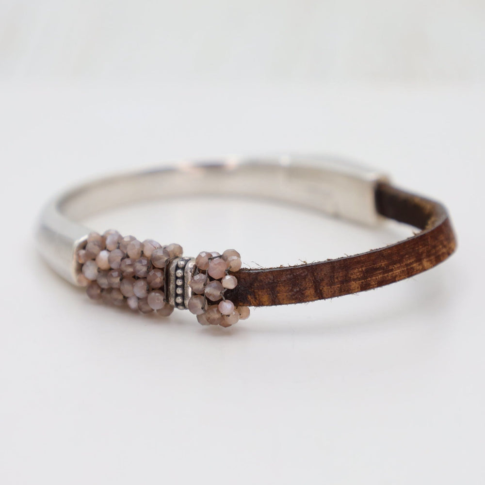 
                  
                    BRC-JM Hand Stitched Small Chocolate Moonstone Bracelet
                  
                