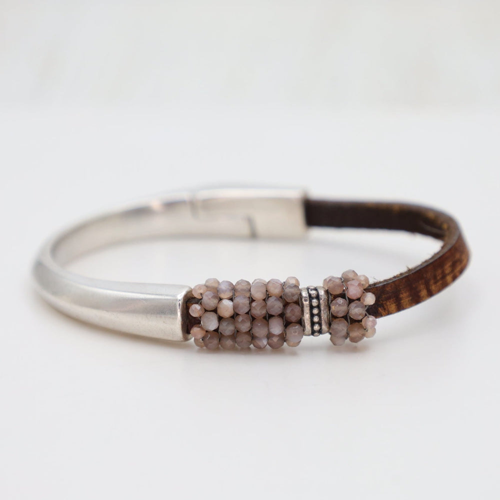 
                  
                    BRC-JM Hand Stitched Small Chocolate Moonstone Bracelet
                  
                