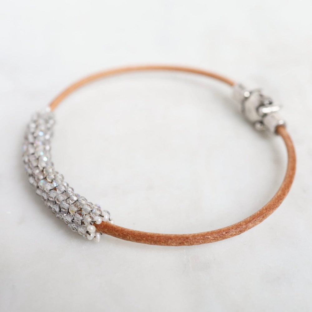 
                  
                    BRC-JM Hand Stitched Sparkly Topaz with Tiny White Pearl Trim on Natural Leather Bracelet
                  
                