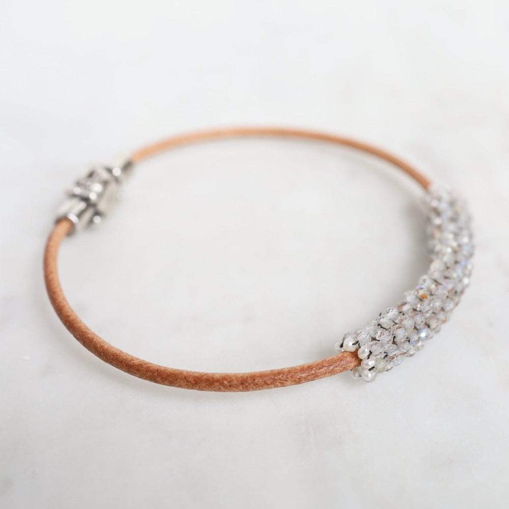 
                  
                    BRC-JM Hand Stitched Sparkly Topaz with Tiny White Pearl Trim on Natural Leather Bracelet
                  
                