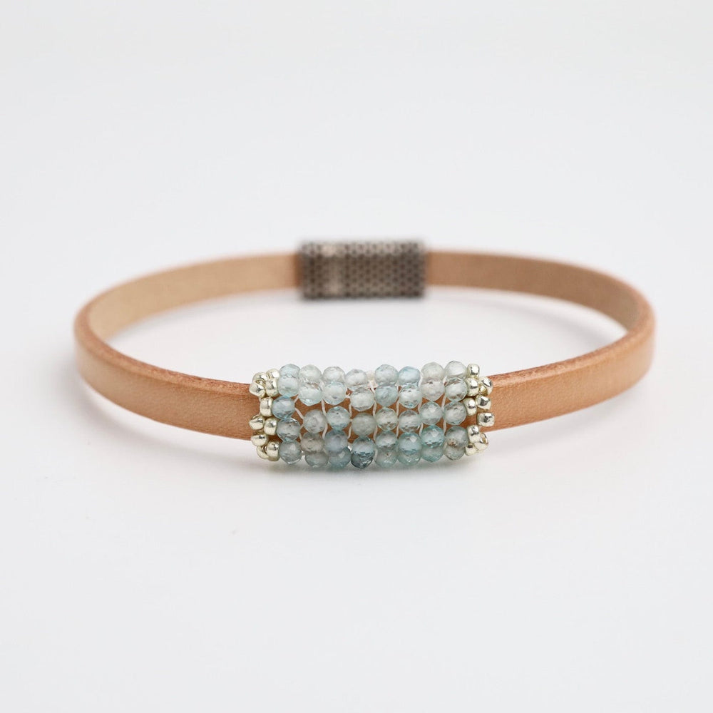 
                      
                        BRC-JM Hand Stitched Tiny Aquamarine Leather Bracelet
                      
                    