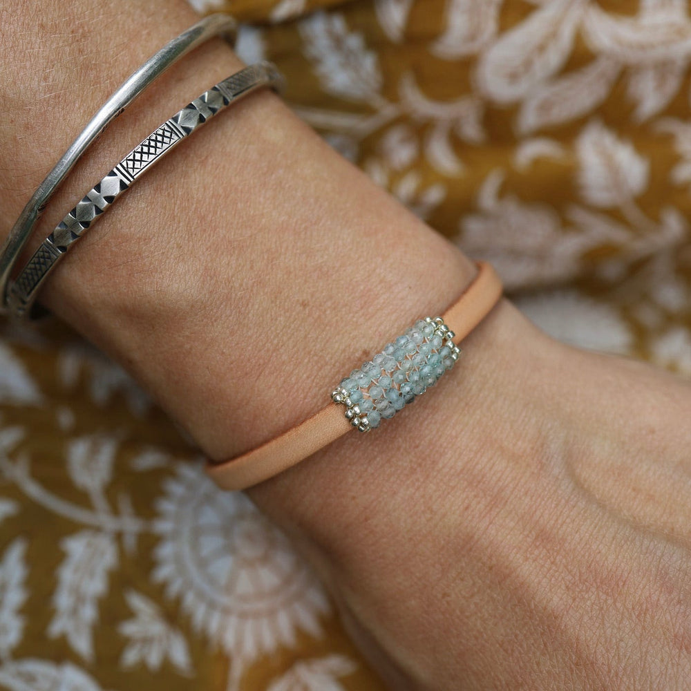 
                      
                        BRC-JM Hand Stitched Tiny Aquamarine Leather Bracelet
                      
                    