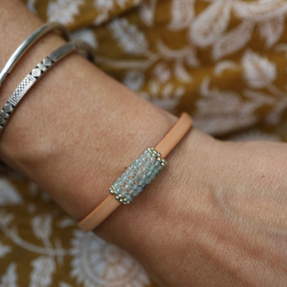 
                      
                        BRC-JM Hand Stitched Tiny Aquamarine Leather Bracelet
                      
                    