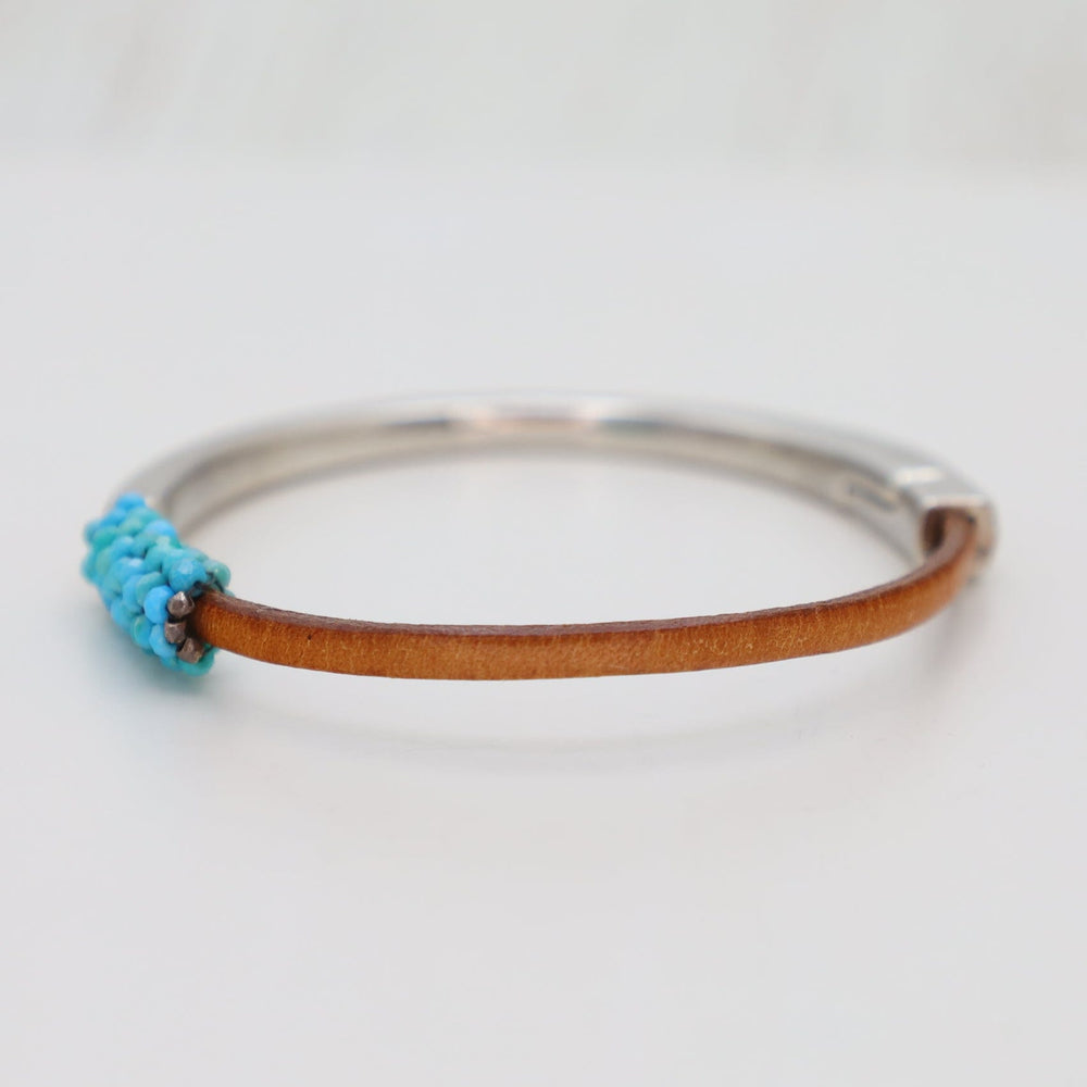 
                  
                    BRC-JM Hand Stitched Tiny Arizona Turquoise Leather Cuff Bracelet
                  
                