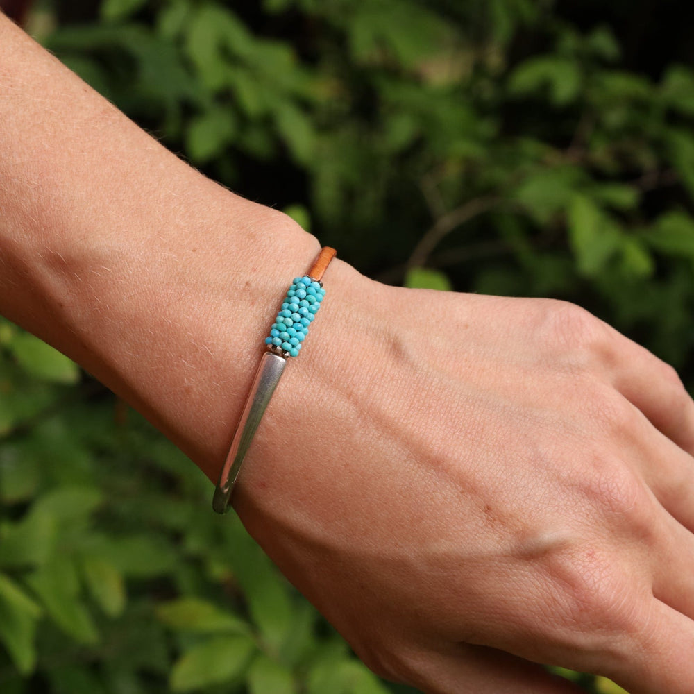 
                  
                    BRC-JM Hand Stitched Tiny Arizona Turquoise Leather Cuff Bracelet
                  
                