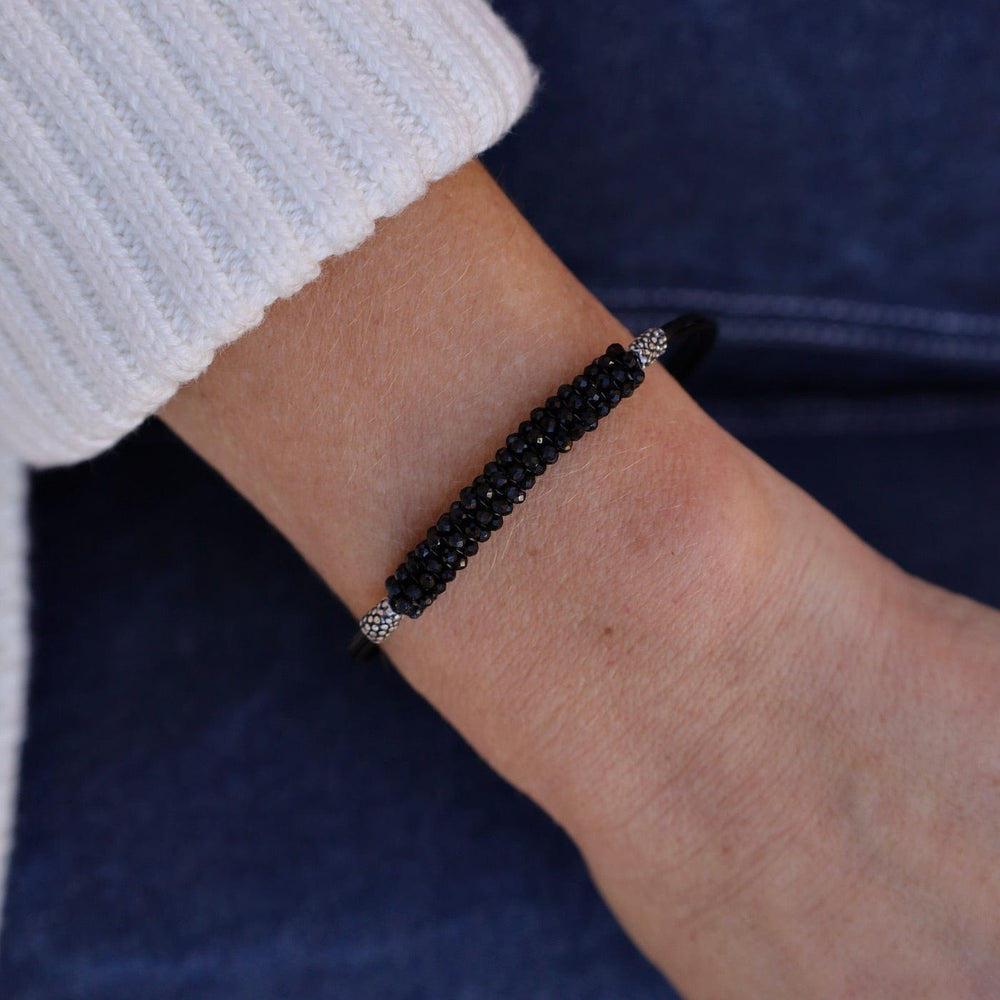 
                      
                        BRC-JM Hand Stitched Tiny Black Spinel Leather Bracelet
                      
                    