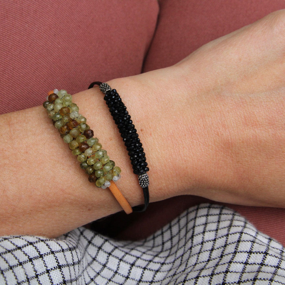 
                  
                    BRC-JM Hand Stitched Tiny Black Spinel & Metal Dot Bracelet
                  
                