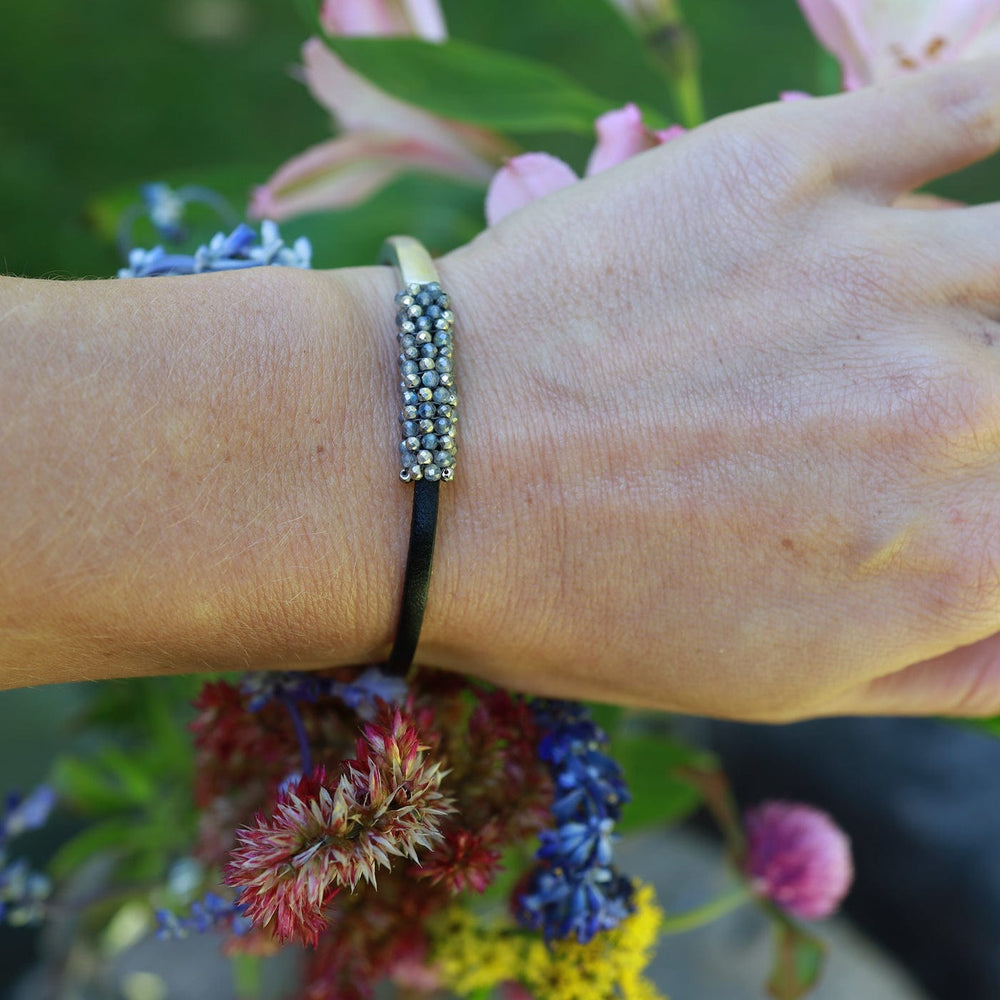 
                  
                    BRC-JM Hand Stitched Tiny Pyrite and Mystic Labradorite Leather 1/2 Cuff Bracelet
                  
                