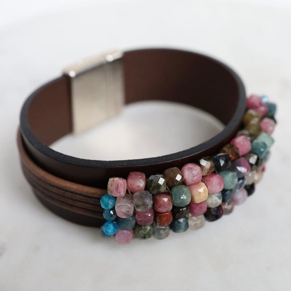 
                  
                    BRC-JM Hand Stitched Tourmaline Cubes with Apatite Trim on Chocolate Leather Bracelet
                  
                