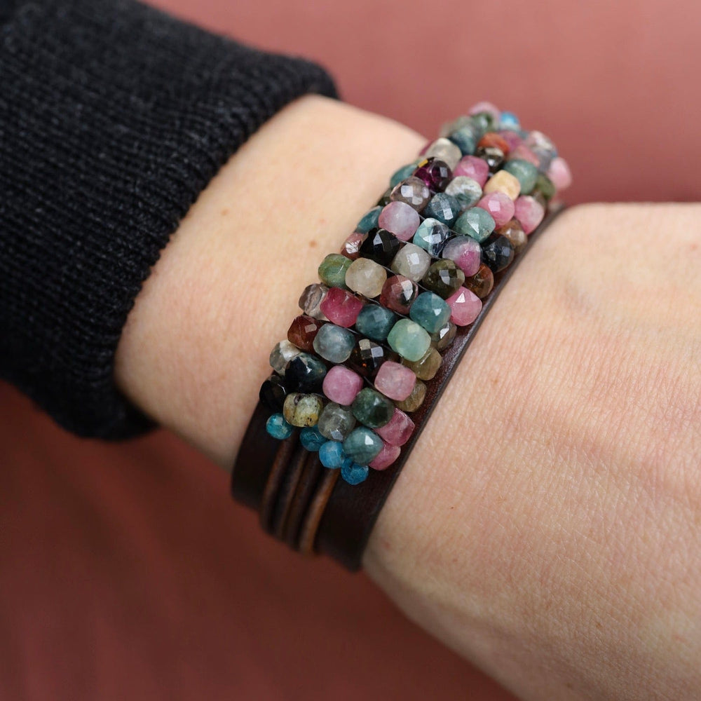 
                  
                    BRC-JM Hand Stitched Tourmaline Cubes with Apatite Trim on Chocolate Leather Bracelet
                  
                