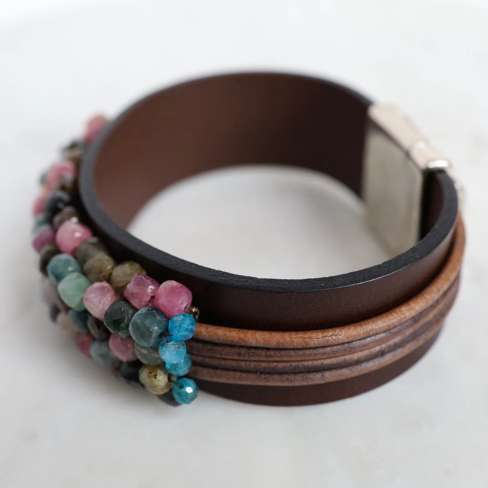 
                  
                    BRC-JM Hand Stitched Tourmaline Cubes with Apatite Trim on Chocolate Leather Bracelet
                  
                