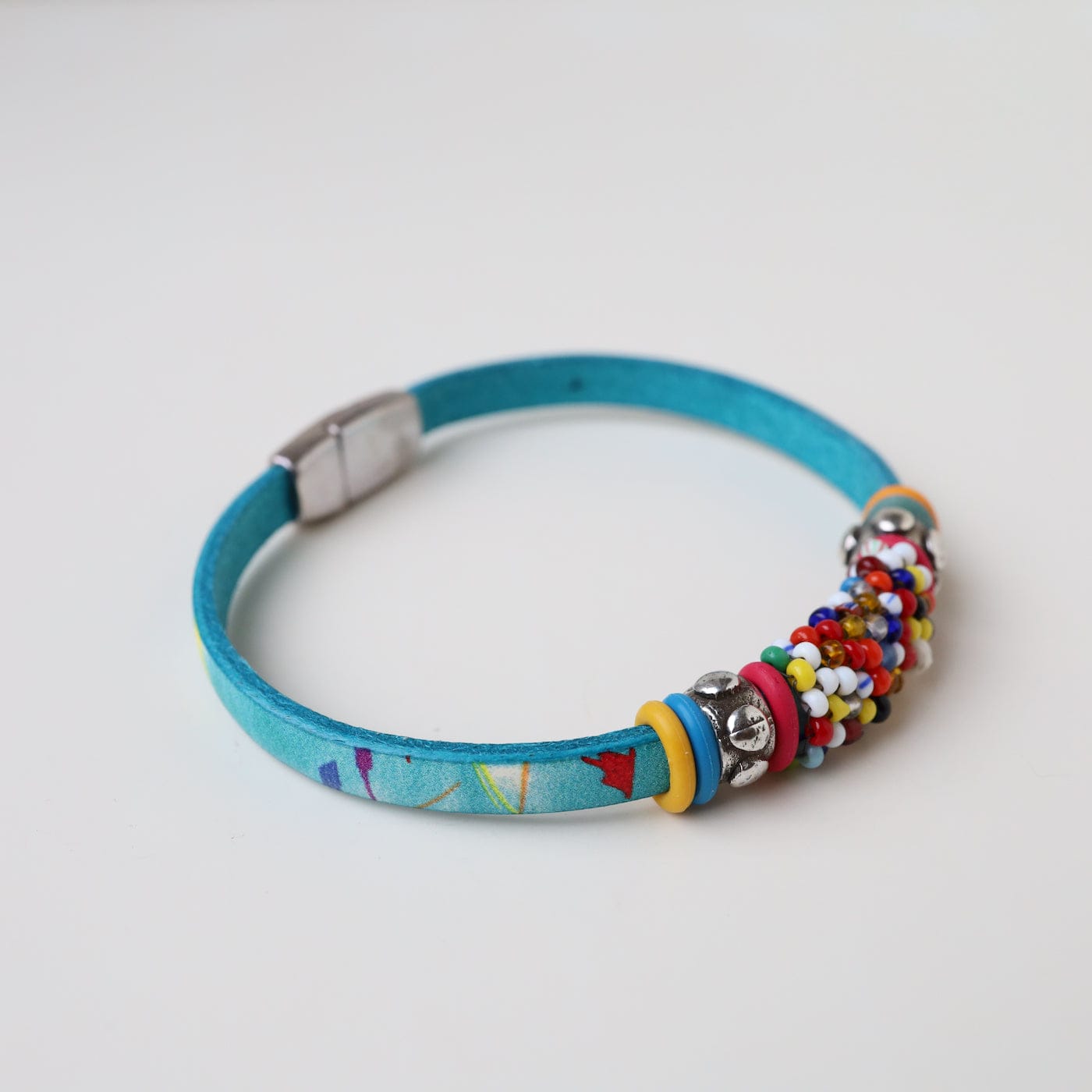 BRC-JM Hand Stitched Vintage & African Beads on Printed Blue Leather Bracelet