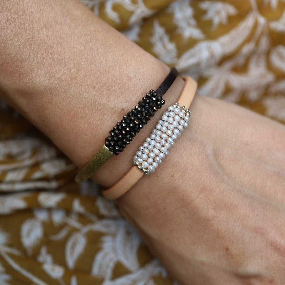 
                  
                    BRC-JM Hand Stitched White Seed Pearls Leather Bracelet
                  
                