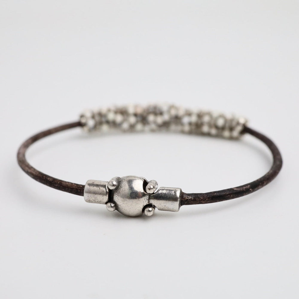 
                      
                        BRC-JM Hand Stitched White Turquoise Leather Bracelet
                      
                    